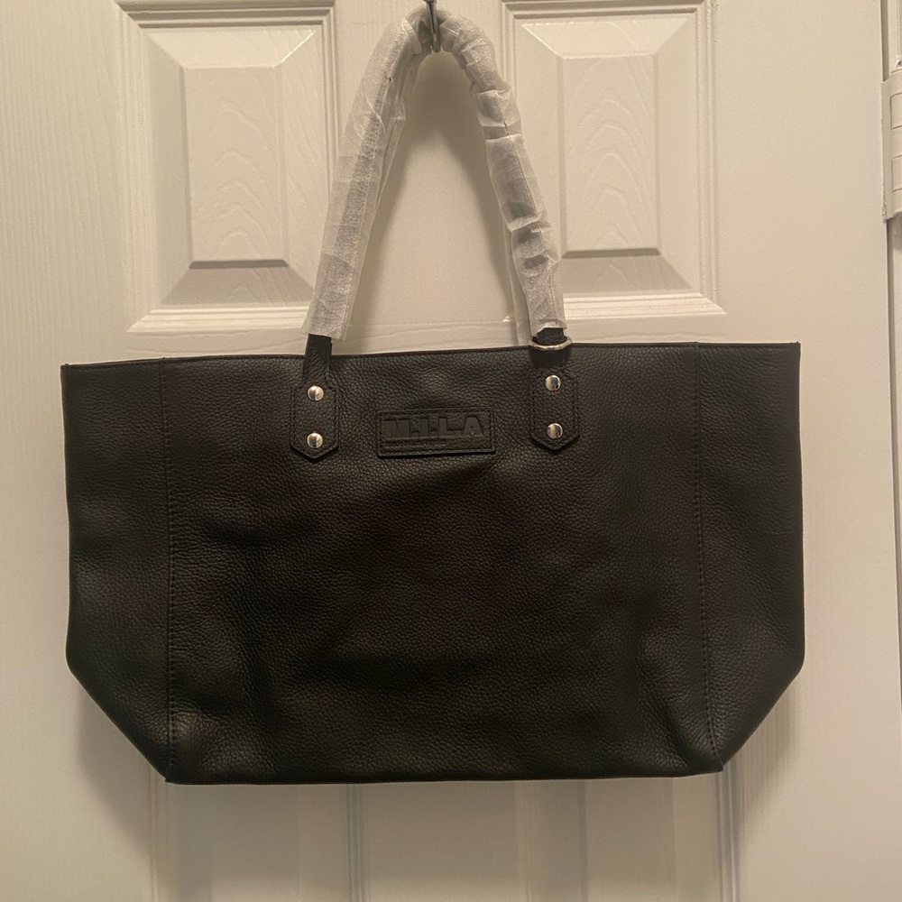 M.I.L.A black leather tote bag 11x17 snap closure with 3 interior pockets